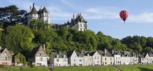 Hot-air balloon flying over the Chateau de Chaumont
