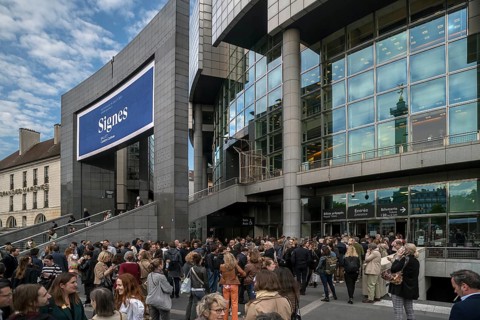 Opera-goers outside the entrances of the Opera Bastille. Paris