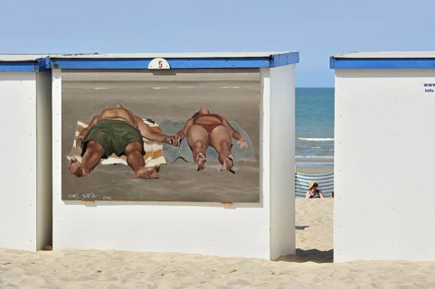 Wall painting of sunbathers on beach cabin along the North Sea coast at Koksijde
