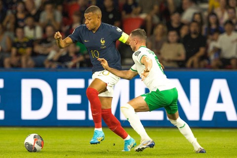Kylian MBAPPE France left in duel with Alan BROWNE Ireland
