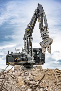 Black Liebherr crawler excavator recycling on demolition site