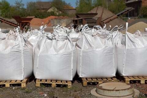 White bags with pebbles