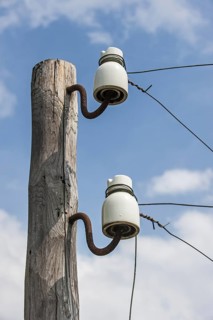 Porcelain pin insulators from Wire of Death