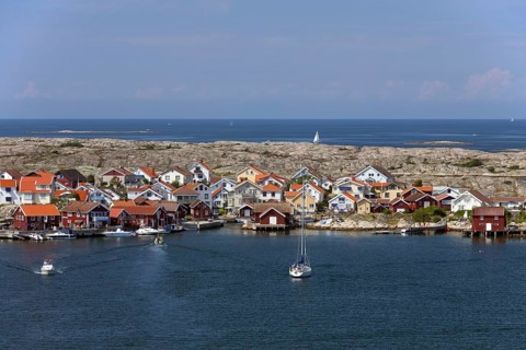 Wooden fishing huts in the village Smoegen