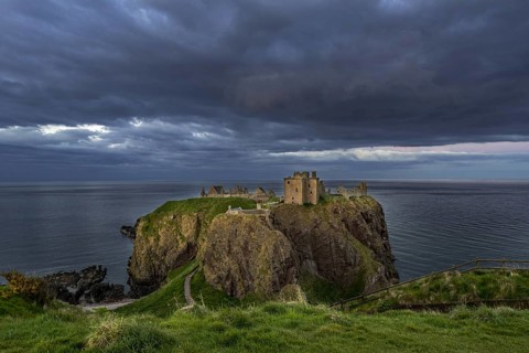 Menacing dark clouds above Dunnottar Castle