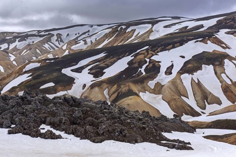 Rhyolite lava and sulphur coloured mountains at Brennisteinsalda volcano near Landmannalaugar