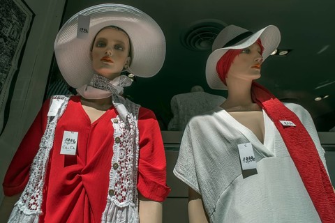 Summer dressed mannequins of a fashion shop