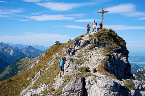 Hiker at the summit of the Grosse Klammspitze