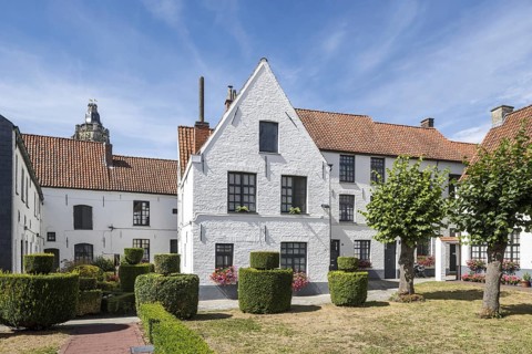 White beguines' houses in courtyard of the Beguinage of Oudenaarde