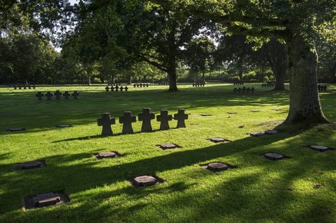 Tombstones and stone crosses at La Cambe German Second World War military cemetery