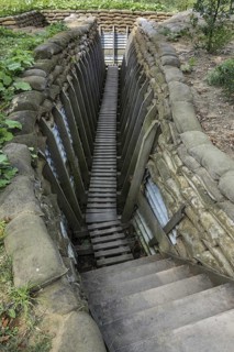 Reconstruction of British First World War One trench showing wooden duckboards on A frames