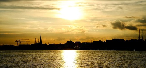 City skyline of Travemuende at sunset. Hanseatic City of Luebeck