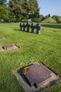 Tombstones and stone crosses at La Cambe German Second World War military cemetery