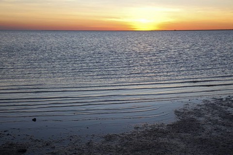 Sunset over Makgadikgadi Salt pan in the Kalahari desert in Botswana
