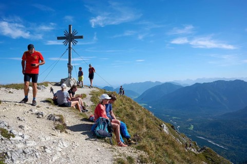 Hiker at the summit of the Grosse Klammspitze