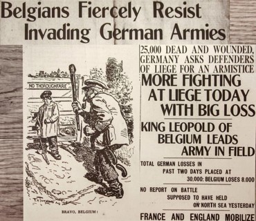WWI newspaper article with cartoon in English paper reporting news about the First World War One front in Belgium