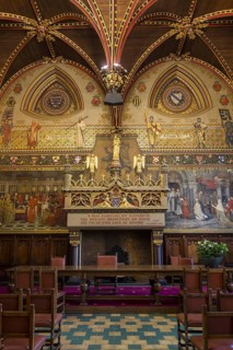 Interior of Bruges' city hall showing the Gothic hall with monumental mantelpiece