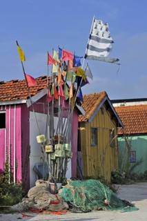 Colourful cabins of oyster farmers in the harbour at Le Chateau-d'Oleron on the island Ile d'Oleron