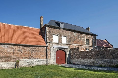 Entrance gate of the renovated Chateau d'Hougoumont