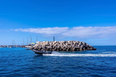 A boat arriving at the marina on the Costa de Adeje in the south of Tenerife