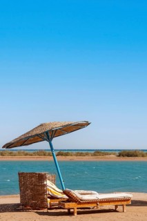 Parasol and sun loungers