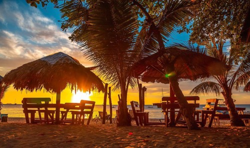 A terrace on the beach at Sunset from West End Beach