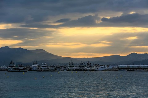 View from the Croisette in the evening of yachts during the Cannes Yachting Festival