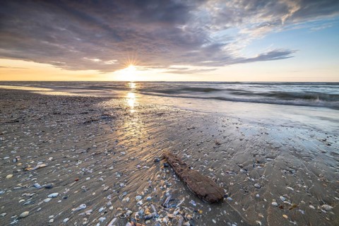 Sunset on the beach of De Panne