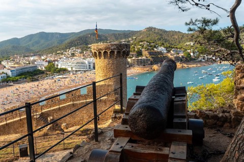 Beautiful war cannon in the castle of Tossa de Mar in summer