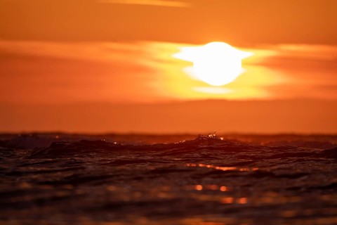 Sunset on the beach of De Panne