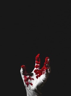 Reaching up hand in white glove with blood stains