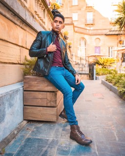 Trendy lifestyle of a Latino guy in the city. Jeans