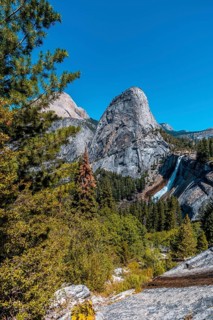 Panoramic of Vernal Falls from the winged top of a tree. California