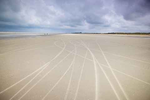 Traces of beach sailors in the sandy beach