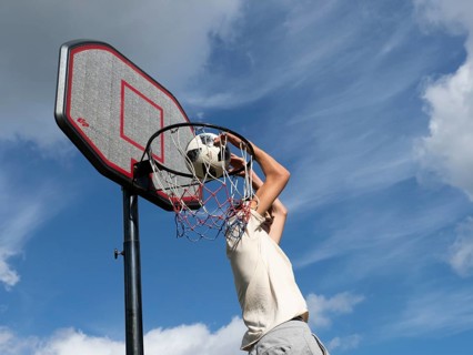 Basketball Jump with the ball to the basket and net