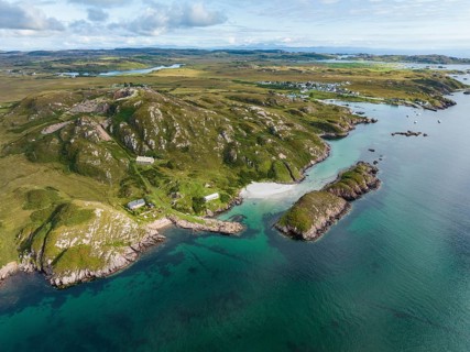 Aerial view of the Ross of Mull peninsula and the fishing village of Fionnphort in the picture on the right