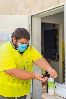 Worker in a recycling factory or clean point and garbage with a face mask and with security protections