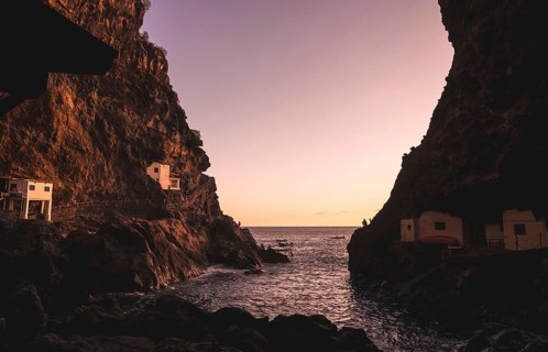 Sunset from inside the cave of the town of Poris de Candelaria on the north-west coast of the island of La Palma