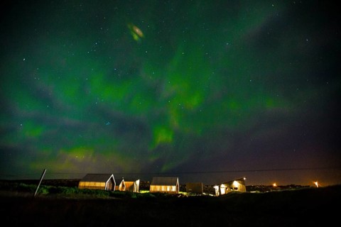 Green lights of the beautiful Northern Lights on the Reykjanes peninsula in southern Iceland