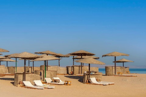 Parasol and sun loungers