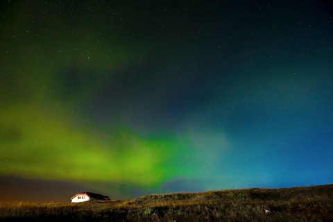 Green lights of the beautiful Northern Lights on the Reykjanes peninsula in southern Iceland