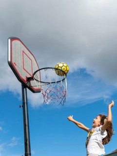 Basketball Jump with the ball to the basket and net