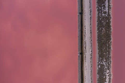Aerial view of a salt works with road