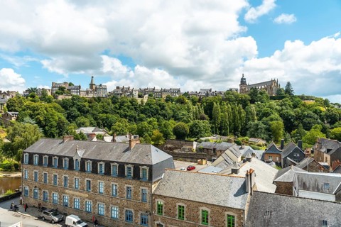 Interior of the castle of Fougeres and the city in the background. Brittany region