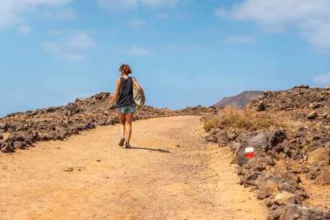 A young woman visiting the Isla de Lobos
