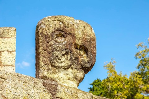 A figure of a head in the temples of Copan Ruinas. Honduras