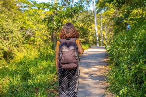 A young woman enjoying the temples of Copan Ruinas. Honduras