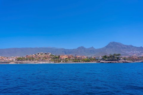 Panoramic view of the Costa de Adeje from a boat in the south of Tenerife