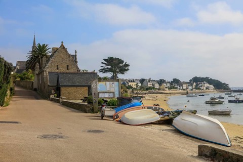 Bay with sandy beach in the centre of the village
