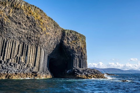 Detail of the uninhabited rocky island of Staffa with the polygonal basalt columns and Fingal's Cave Hebrides